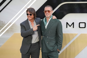 Tom Cruise junto a Brad