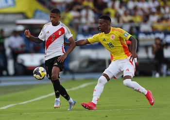 Cristian Borja y Andy Polo en el último juego de Colombia y Perú-crédito Luisa González/REUTERS