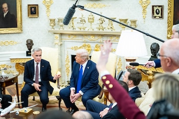 **EMBARGO: No electronic distribution, Web posting or street sales before TUESDAY 12:01 A.M. ET AUG. 18, 2026. No exceptions for any reasons. EMBARGO set by source.** FILE Ñ President Donald Trump meets with Prime Minister Mark Carney of Canada in the Oval Office of the White House in Washington, Oct. 7, 2025. Canada is bracing for a U.S. tariff deadline, when a number of new levies by the Trump administration will come into effect unless negotiators strike an 11th-hour deal. (Haiyun Jiang/The New York Times)