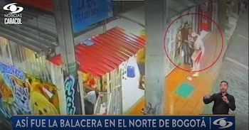 En medio del enfrentamiento, los mismos trabajadores también habrían accionado un arma de fuego contra uno de los atacantes, quien ya se encontraba herido y buscaba refugio detrás del vehículo del comerciante - crédito Noticias Caracol