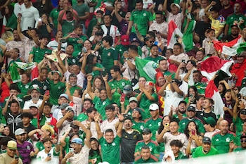 Sep 12, 2023; Atlanta, GA, USA; Mexico fans celebrate in the stands after their third goal against Uzbekistan during the second half at Mercedes-Benz Stadium. Mandatory Credit: John David Mercer-USA TODAY Sports