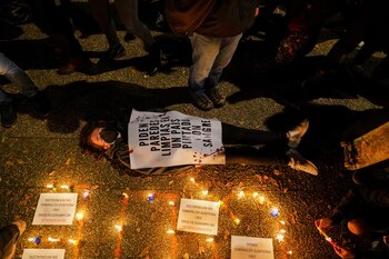 A demonstrator performs as a