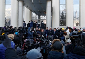 Lawyer Ilya Novikov speaks to the media outside the Moscow City Court building after a hearing to consider the closure of the Memorial human rights center in Moscow, Russia, December 29, 2021. REUTERS/Evgenia Novozhenina