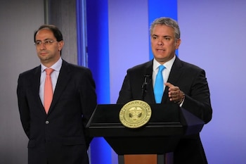 Iván Duque y su entonces ministro de Comercio, José Manuel Restrepo