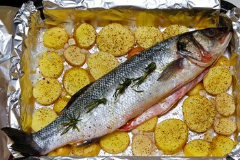 Prepared bass fish and potato