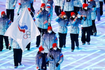 2022 Beijing Olympics - Opening Ceremony - National Stadium, Beijing, China - February 4, 2022. Flag bearers Olga Fatkulina of the Russian Olympic Committee and Vadim Shipachev of the Russian Olympic Committee lead their delegation during the athletes parade at the opening ceremony. REUTERS/Evgenia Novozhenina