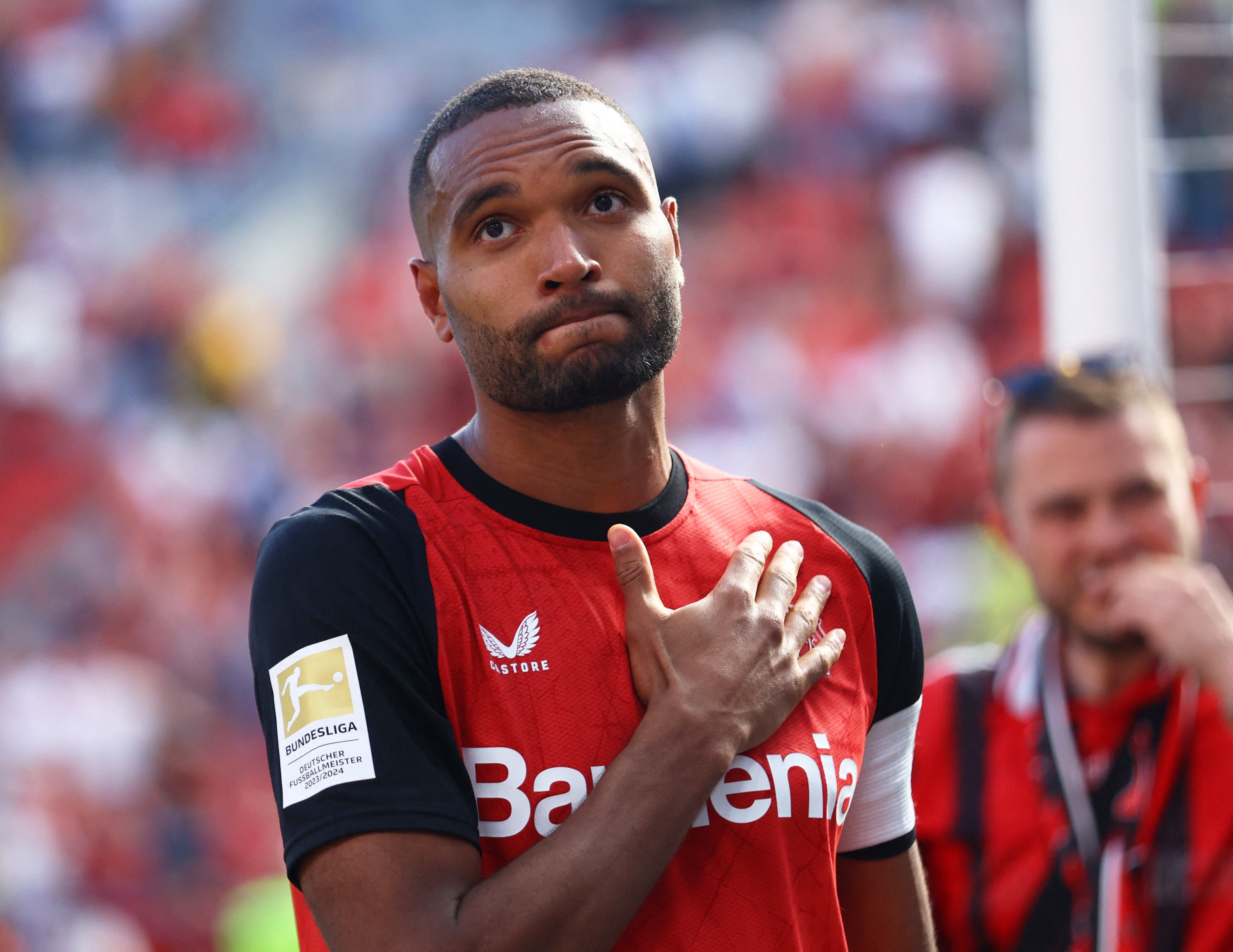 Soccer Football - Bundesliga - Bayer Leverkusen v Borussia Dortmund - BayArena, Leverkusen, Germany - May 11, 2025 Jonathan Tah applauds fans after playing his last home game for Bayer Leverkusen REUTERS/Thilo Schmuelgen DFL REGULATIONS PROHIBIT ANY USE OF PHOTOGRAPHS AS IMAGE SEQUENCES AND/OR QUASI-VIDEO.