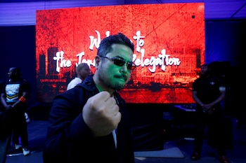 Katsuhiro Harada, Japanese director, producer and creator of the video game Tekken, gestures as he visits the Paradise Game room at the Cosmos supermarket during the Abidjan International Audiovisual Content Fair (SICA) in Abidjan, Ivory Coast, June 27, 2025. REUTERS/Luc Gnago