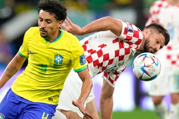 Brazil's Marquinhos, left, and Croatia's