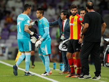 Soccer Football - Club World Cup - Match for fifth place - Esperance Sportive de Tunis v Guadalajara - Hazza Bin Zayed Stadium, Al Ain City, United Arab Emirates - December 18, 2018 Guadalajara's Raul Gudino is substituted for Guadalajara's Miguel Jimenez REUTERS/Andrew Boyers
