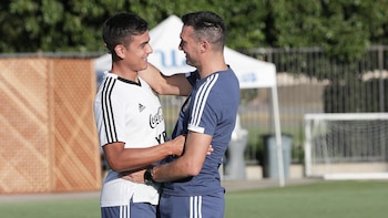 El entrenador junto a Paulo