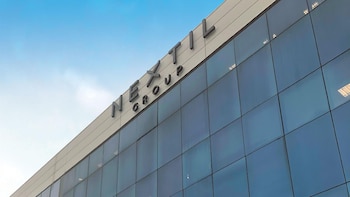 Nextil sube más de un