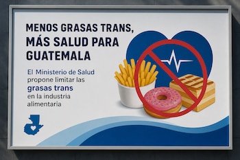 Un cartel publicitario que incluye papas fritas, una dona y un pastel cruzados por una señal roja de prohibición junto a un corazón azul.