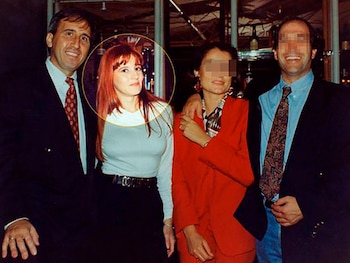 Angie Molina junto a su