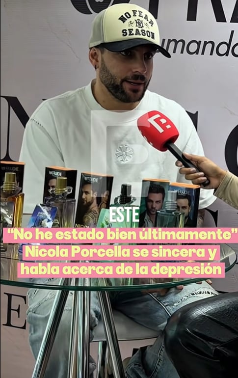 Nicola Porcella responde a preguntas de la prensa sobre su estado de salud mental frente a una mesa con productos de perfumería.