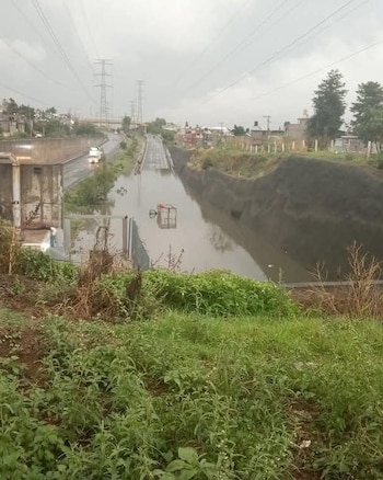 Inundación lluvias Circuito Exterior Mexiquense Cuautitlán Izcalli Edomex