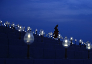 A Buddhist monk walks among