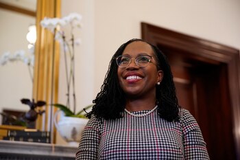 U.S. Supreme Court nominee Judge Ketanji Brown Jackson reacts as she meets with U.S. Senator Bill Hagerty (R-TN) on Capitol Hill in Washington, U.S., March 29, 2022. REUTERS/Elizabeth Frantz