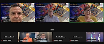 Captura de pantalla de videoconferencia con nueve participantes en cuadrícula. Tres personas en la fila superior con fondos de contenedores portuarios y texto