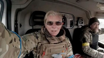 Paievska y un conductor en