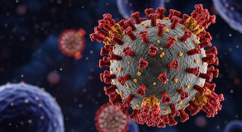 Primer plano de una representación 3D del virus SARS-CoV-2, mostrando una esfera grisácea con múltiples protuberancias rojas y amarillas sobre un fondo oscuro.