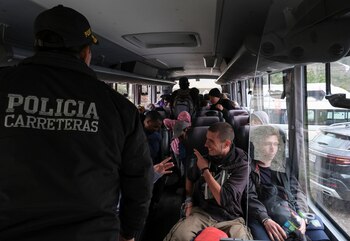 A police officer talks to