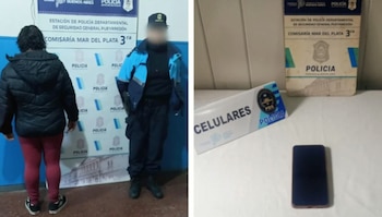 Una mujer de espaldas junto a una agente de policía ante un cartel institucional y un teléfono celular sobre una mesa