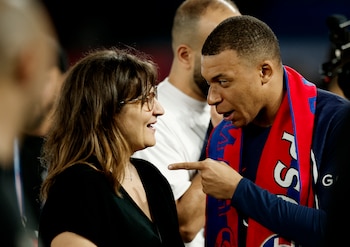 Kylian Mbappe junto a