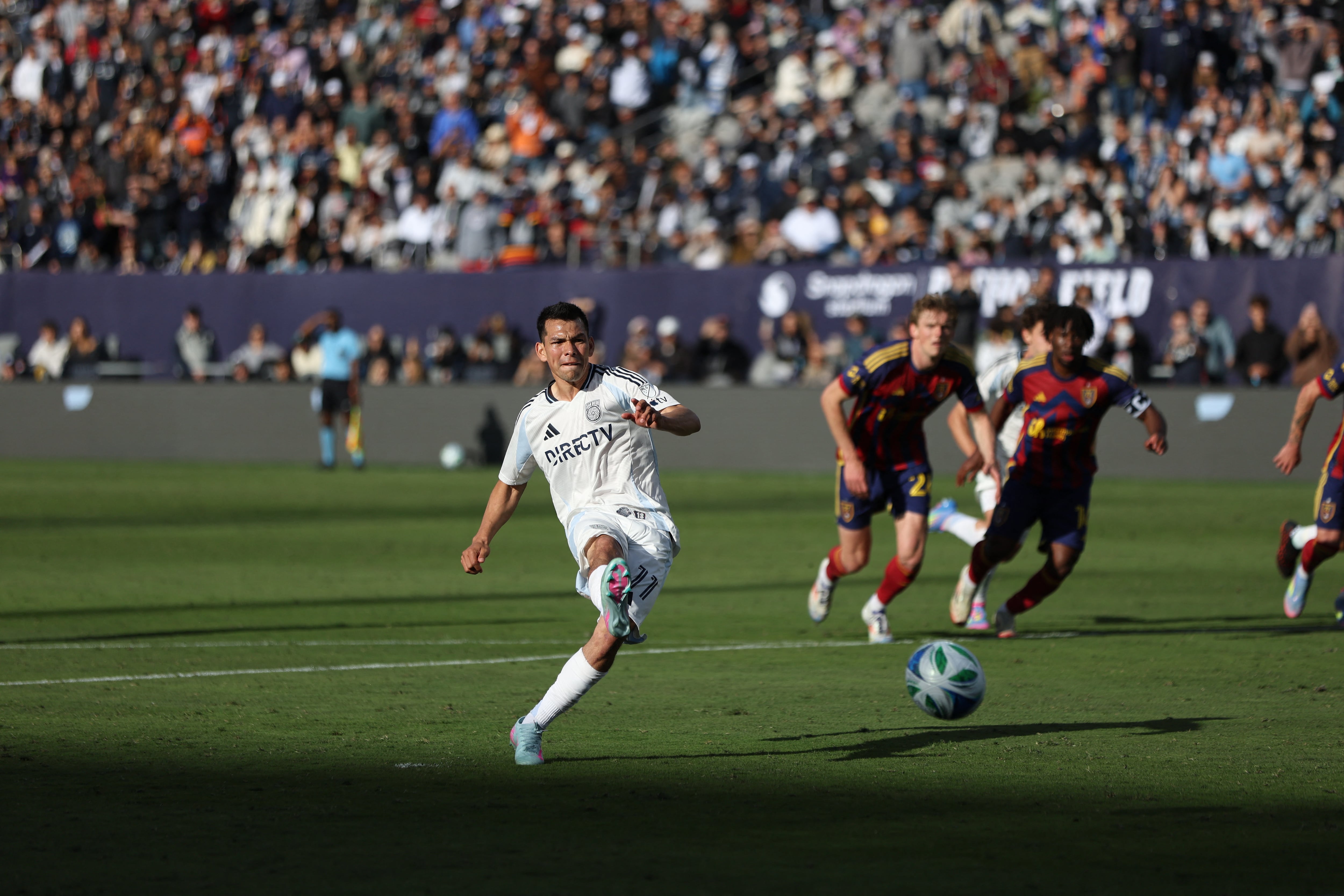 Apr 26, 2025; San Diego, California, USA; San Diego FC forward Chucky Lozano (11) scores on a penalty kick during the first half against Real Salt Lake at Snapdragon Stadium. Mandatory Credit: Abe Arredondo-Imagn Images