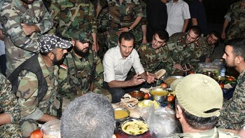 Bashar Al Assad, junto a