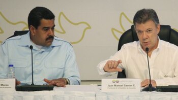 Nicolás Maduro y Juan Manuel Santos (AP)