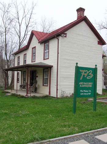 La casa de los Barreiro en The Plains, donde funcionaba su negocio de arte y antigüedades.