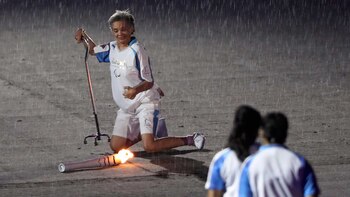 Bajo una intensa lluvia, Marcia Malsar no se dio por vencida (Reuters)