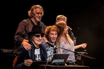 Raúl Porchetto junto a Charly