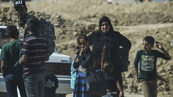 Gente huyendo de Mosul (AFP)