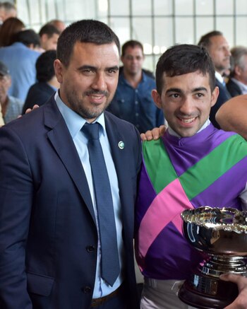 El presidente Instituto de Lotería