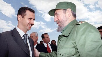 Bashar al Assad junto a