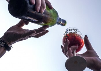 Women sample and drink wine