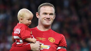 Rooney junto a su hijo