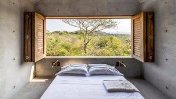 El dormitorio está en la parte superior de la vivienda, que conduce hacia una playa paradisíaca