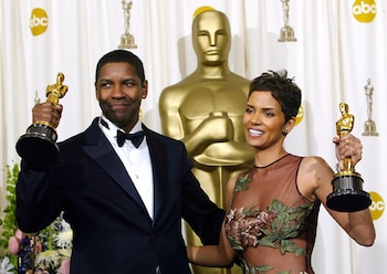 Denzel Washington y Halle Berry ganadores por sus actuaciones en los filmes “Training Day” (2001) y “Monster’s Ball” (2001), respectivamente