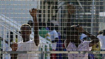 Inmigrantes en un centro de