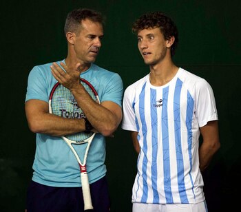 Renzo Olivo junto a Daniel