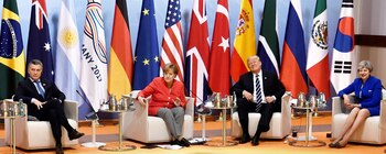 Mauricio Macri, Angela Merkel, Donald Trump y Theresa May, juntos en Hamburgo (Reuters)