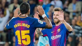 Paulinho y Lionel Messi, futbolistas