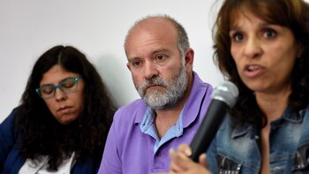 Heredia (der.) junto a Sergio