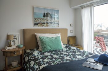 El respaldo de cama, tapizado