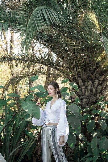 Top con mangas abullonadas ($