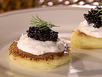 Blini con crema agria y