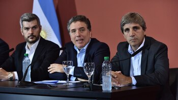 Peña, Dujovne y Caputo durante